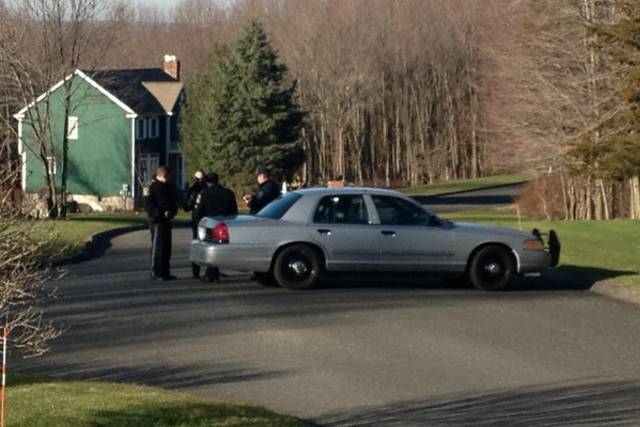 Police outside the shooter's home in Connecticut
